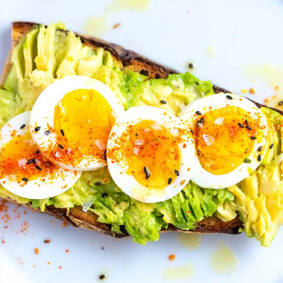 Hard-boiled eggs, toast, and avocado